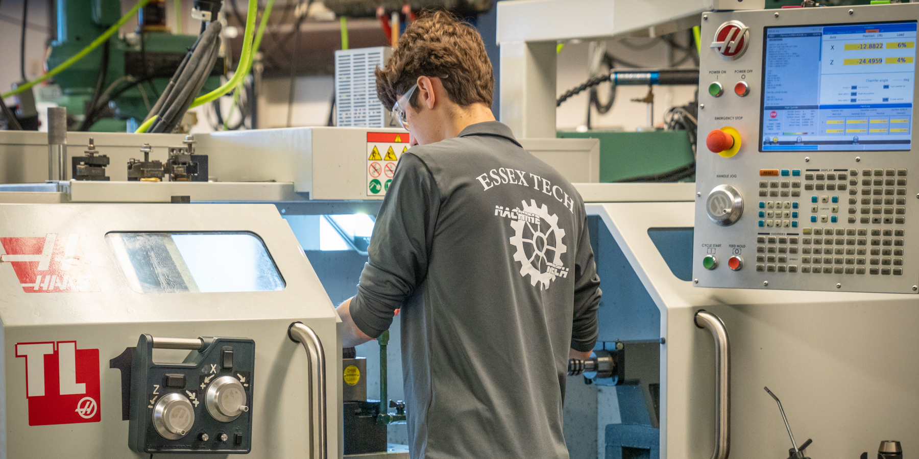 A student works on making custom parts.